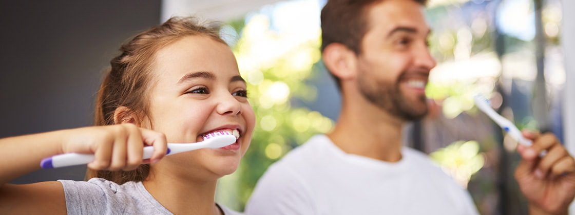 Child brushing teeth